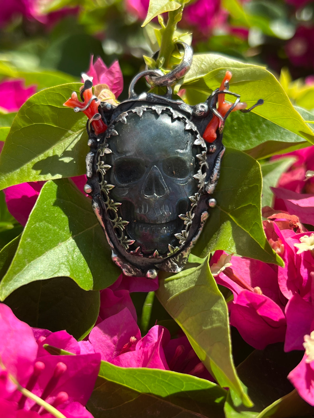 Labradorite skull with coral horns pendant
