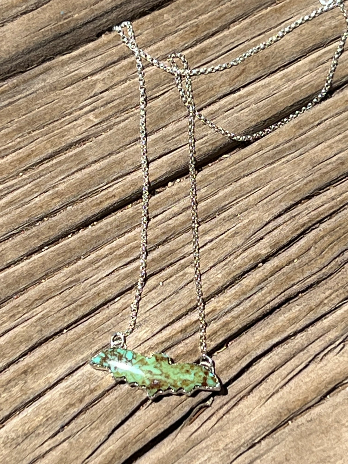 Small Turquoise bat pendant 16 inches
