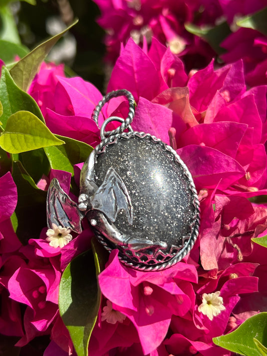 Black sunstone dragon pendant.