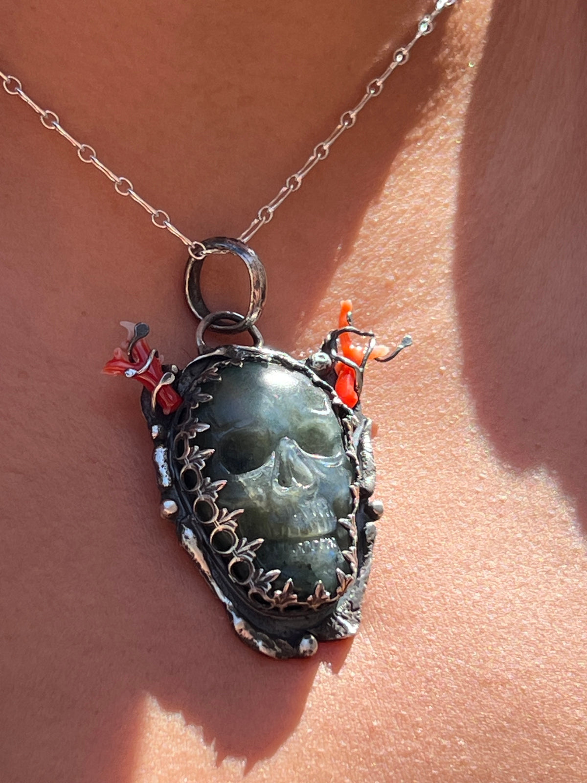 Labradorite skull with coral horns pendant