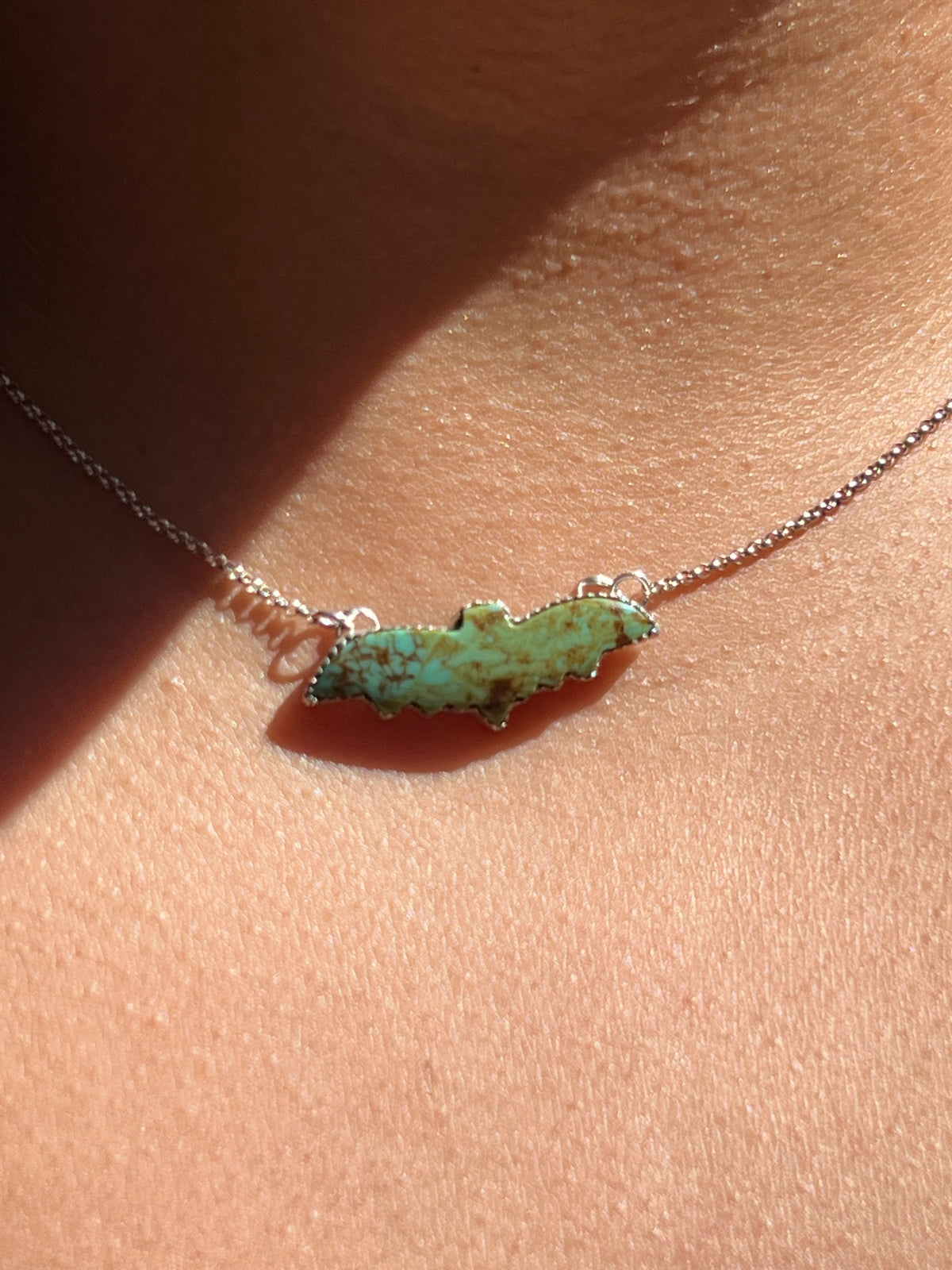Small Turquoise bat pendant 16 inches