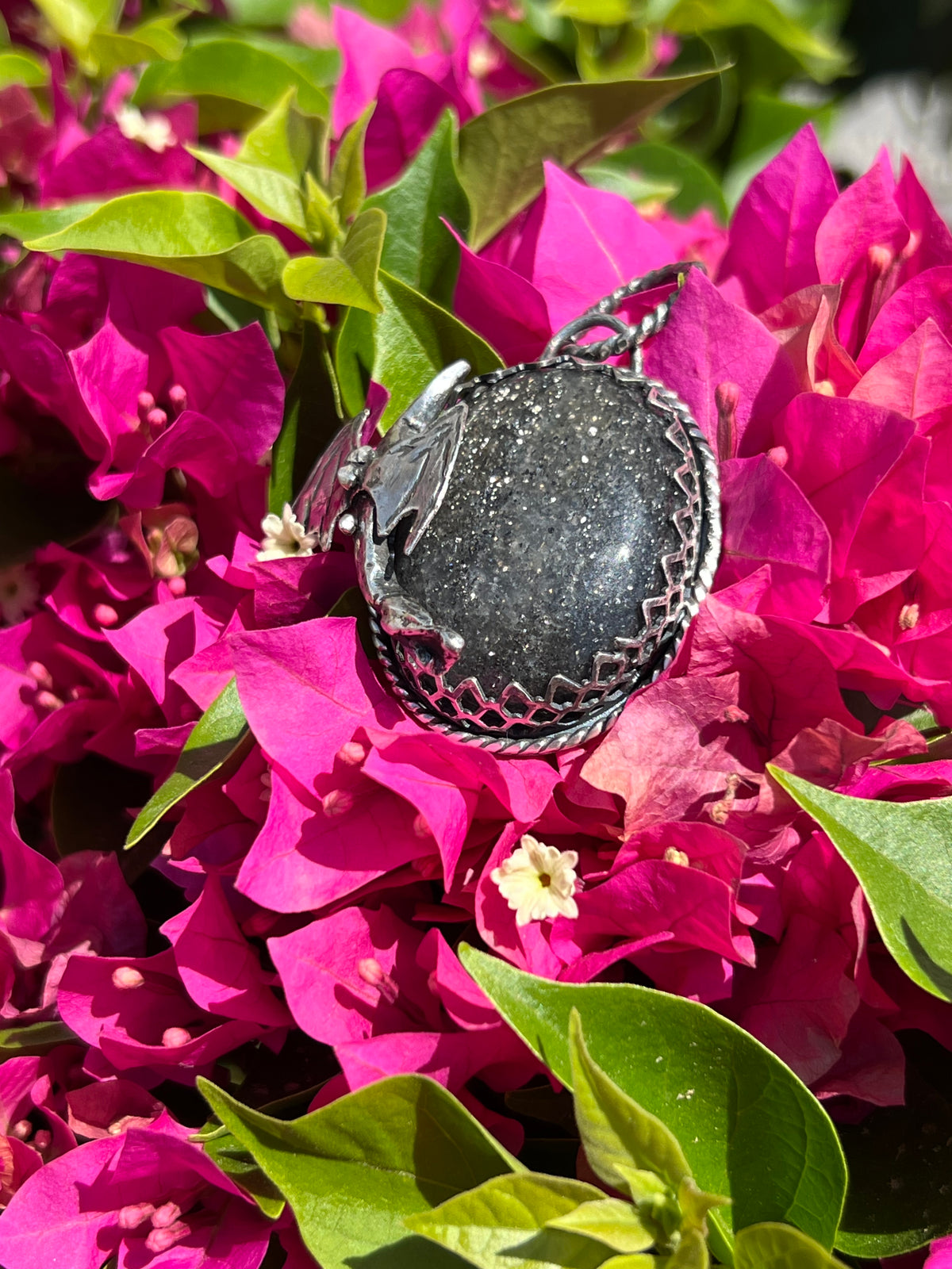 Black sunstone dragon pendant.