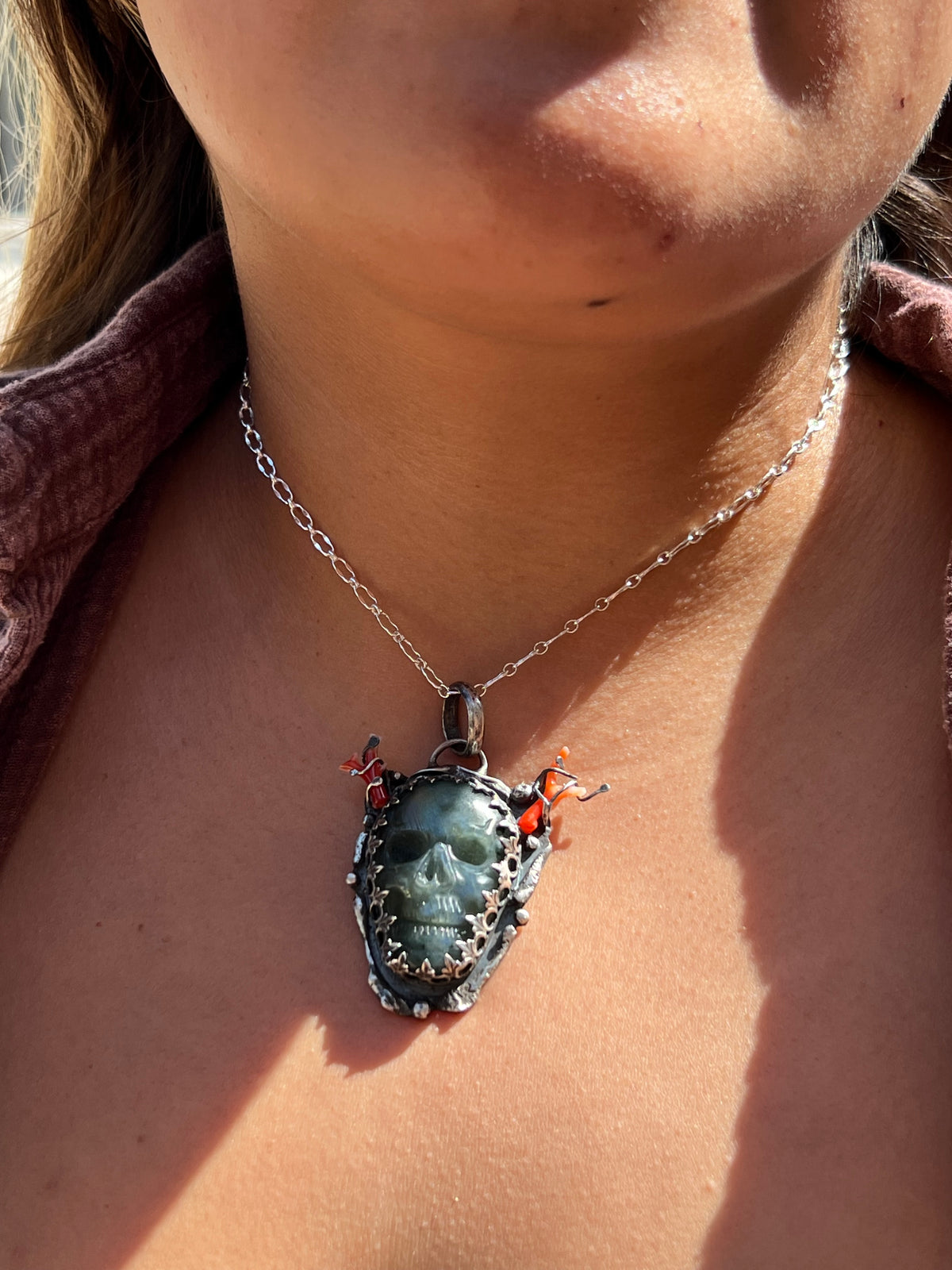Labradorite skull with coral horns pendant