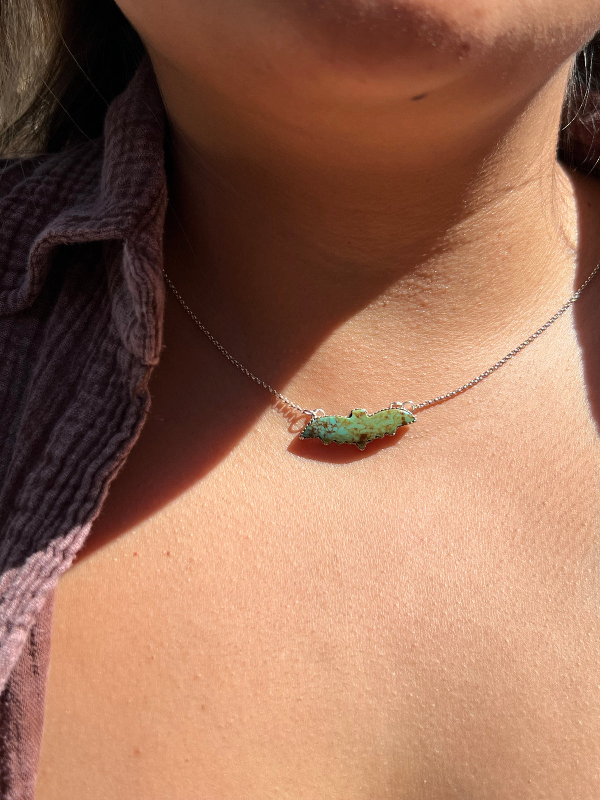 Small Turquoise bat pendant 16 inches
