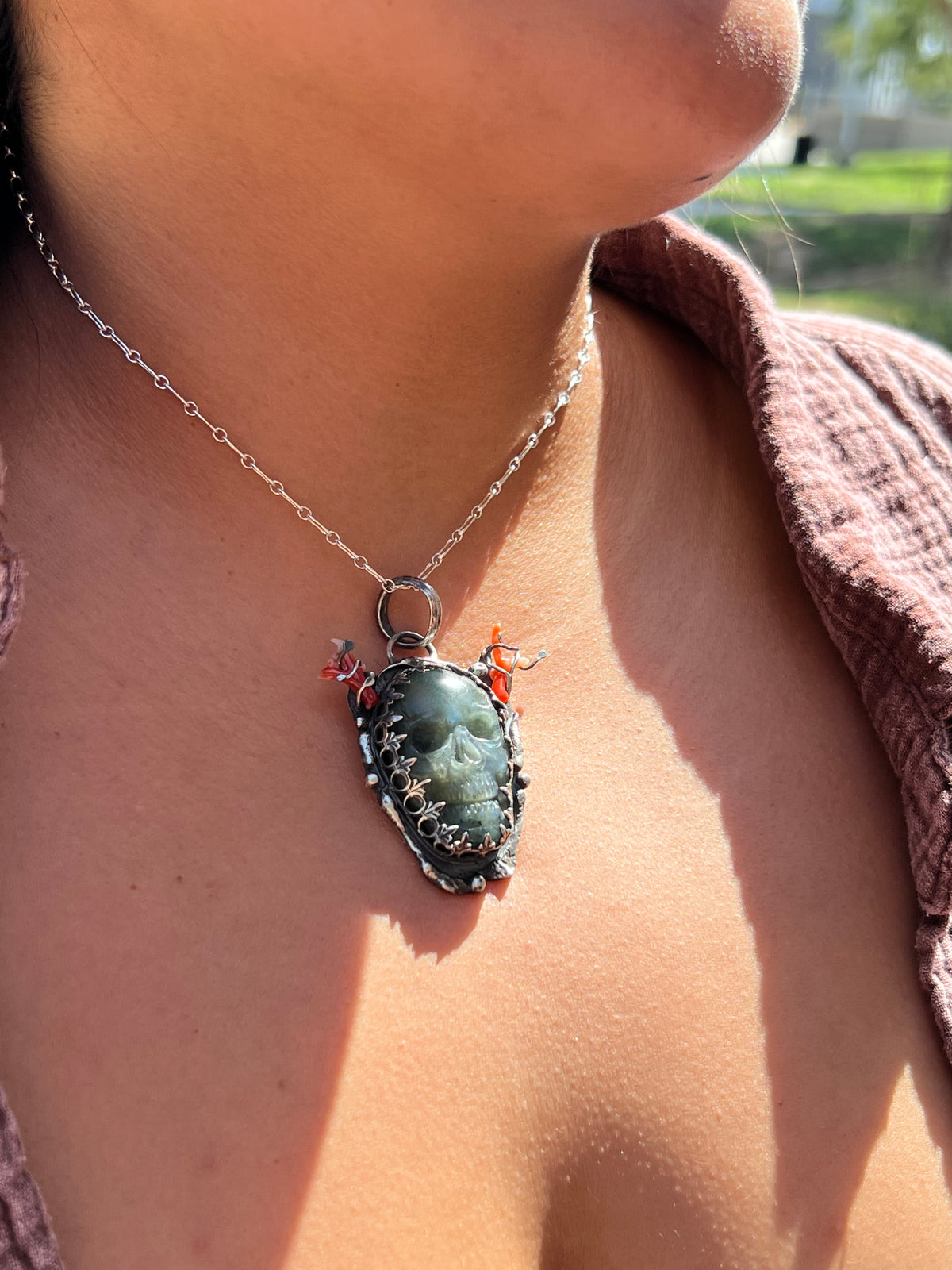 Labradorite skull with coral horns pendant