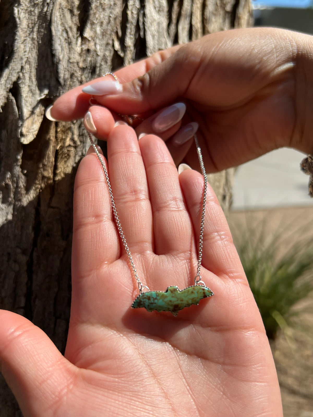 Small Turquoise bat pendant 16 inches
