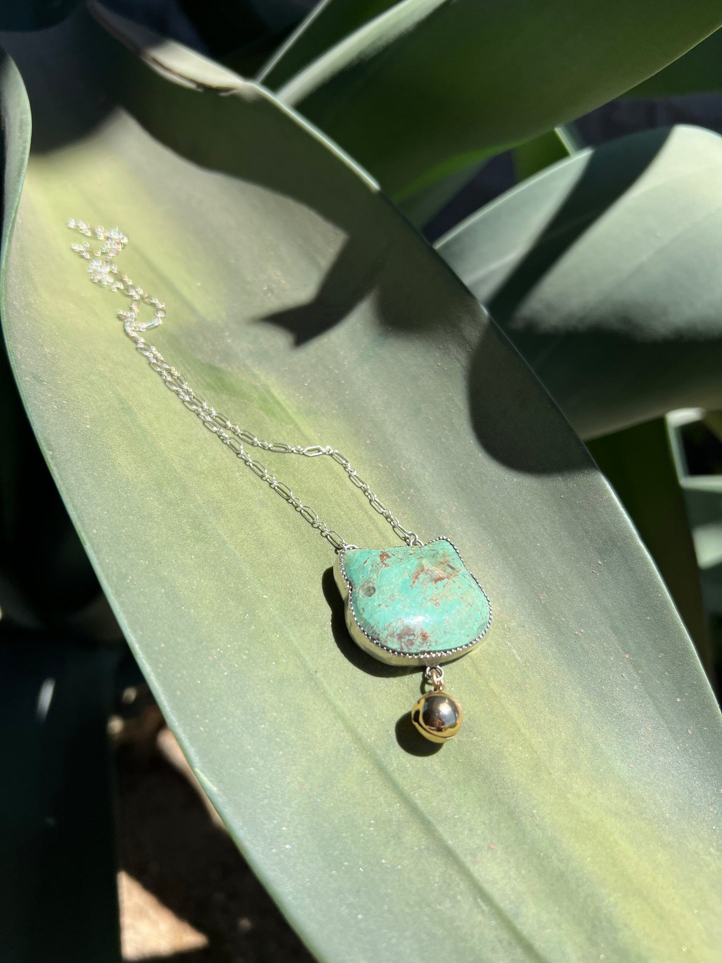Turquoise cat pendant with bell 1