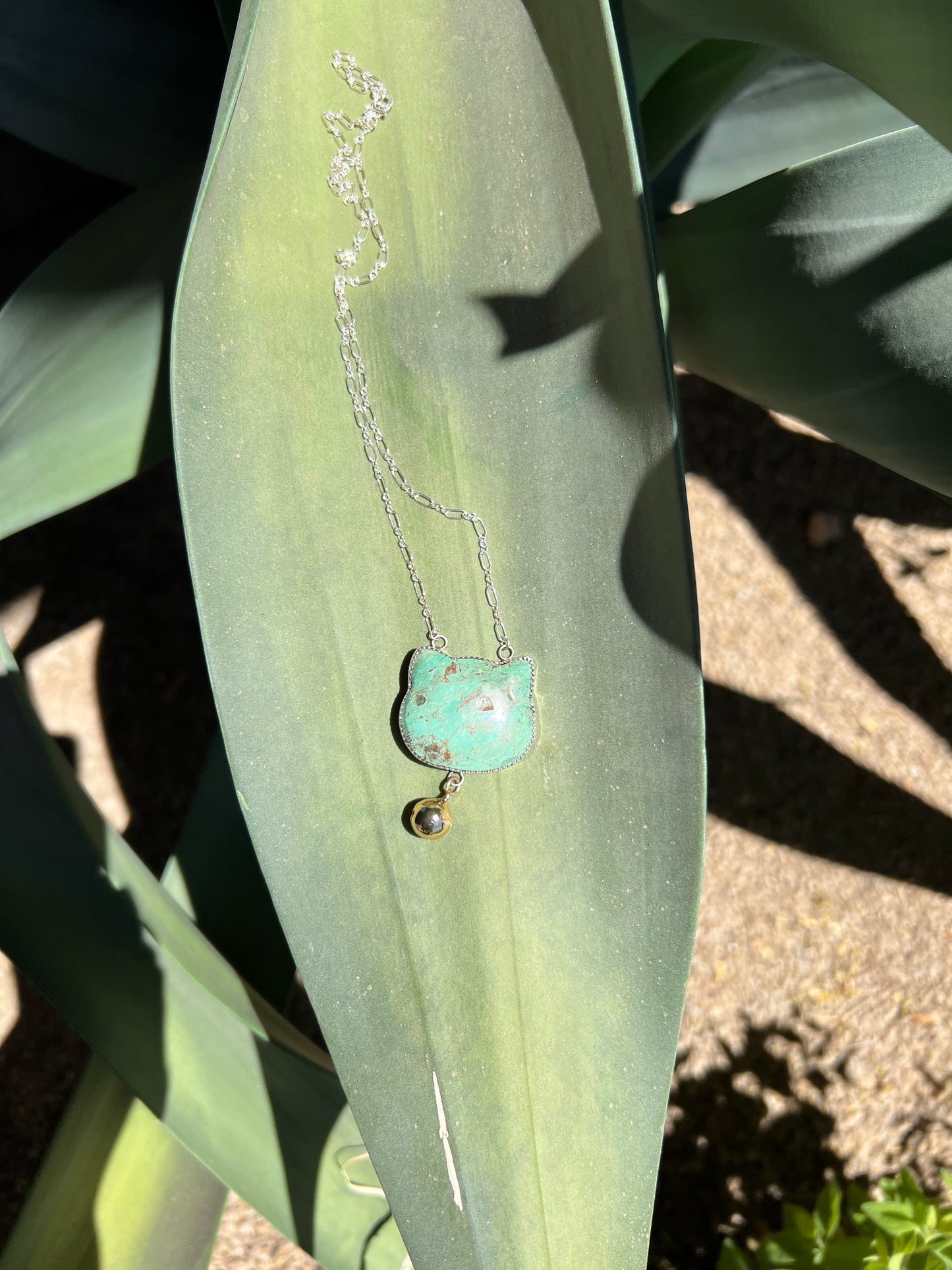 Turquoise cat pendant with bell 1